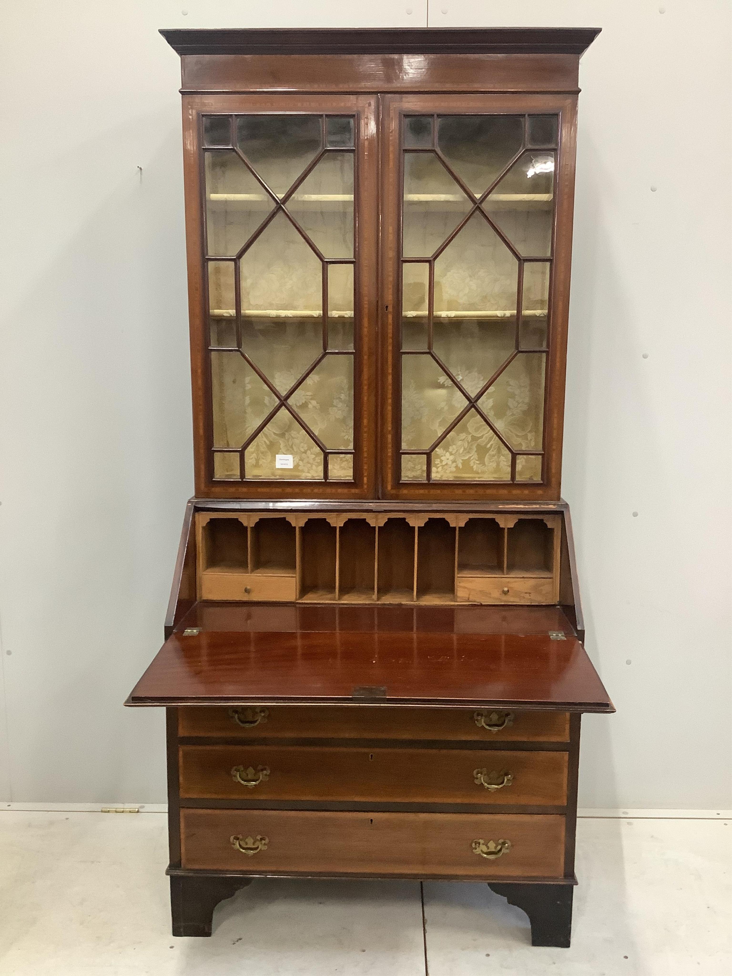 An Edwardian satinwood banded mahogany bureau bookcase, width 92cm, height 203cm. Condition - fair to good